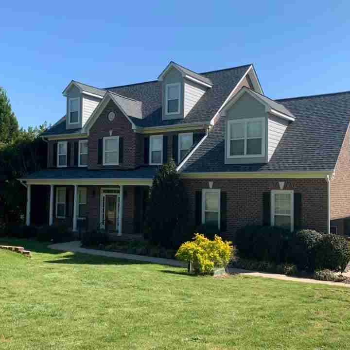 Davis Roofing Co Inc offers expert residential roofing services for beautiful homes.