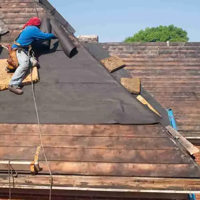 Professional roof repair service by Davis Roofing Co Inc on residential homes.